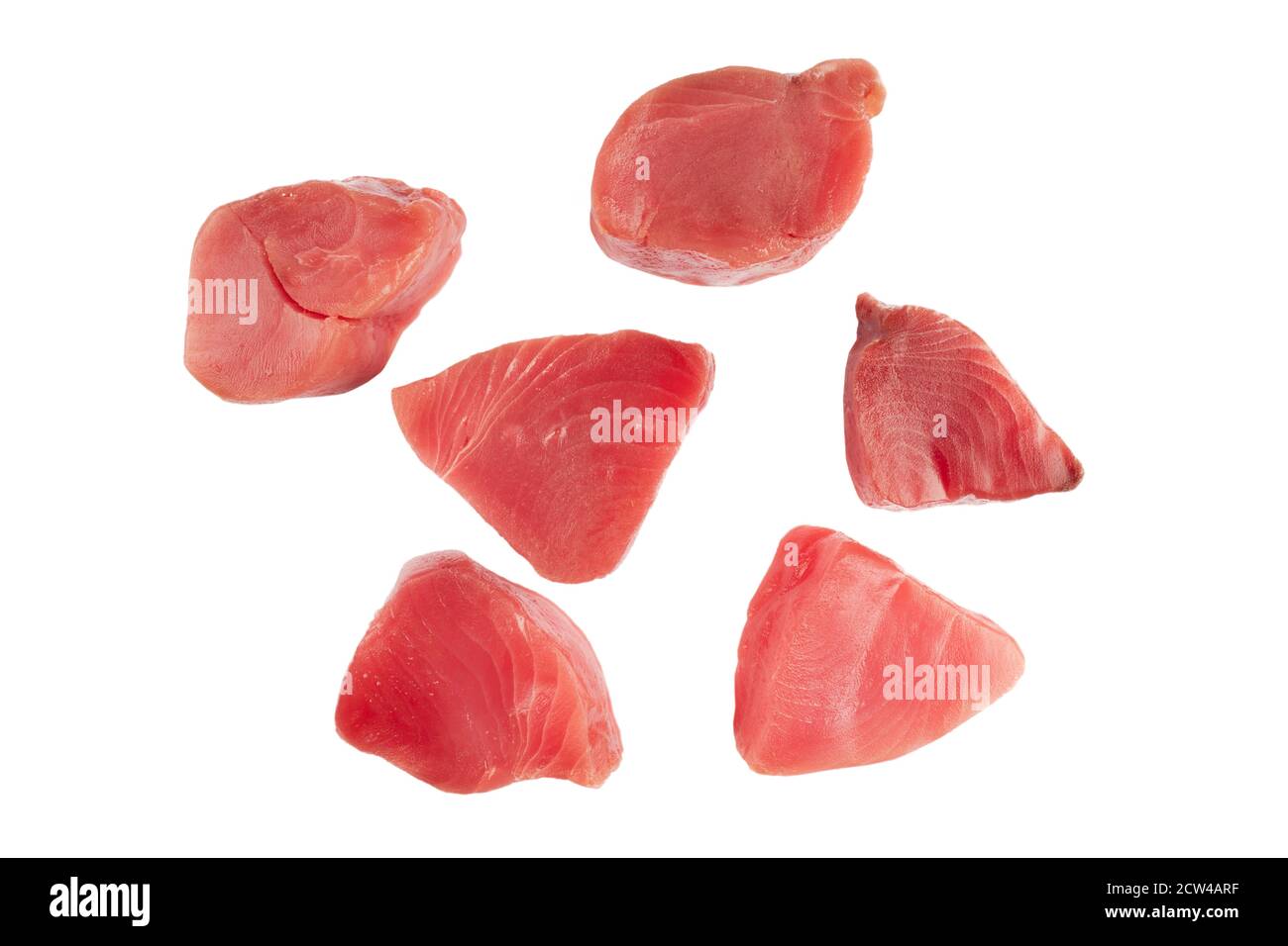 Yellow fin tuna steaks isolated on black background. Fresh rare tuna steaks isolated on black