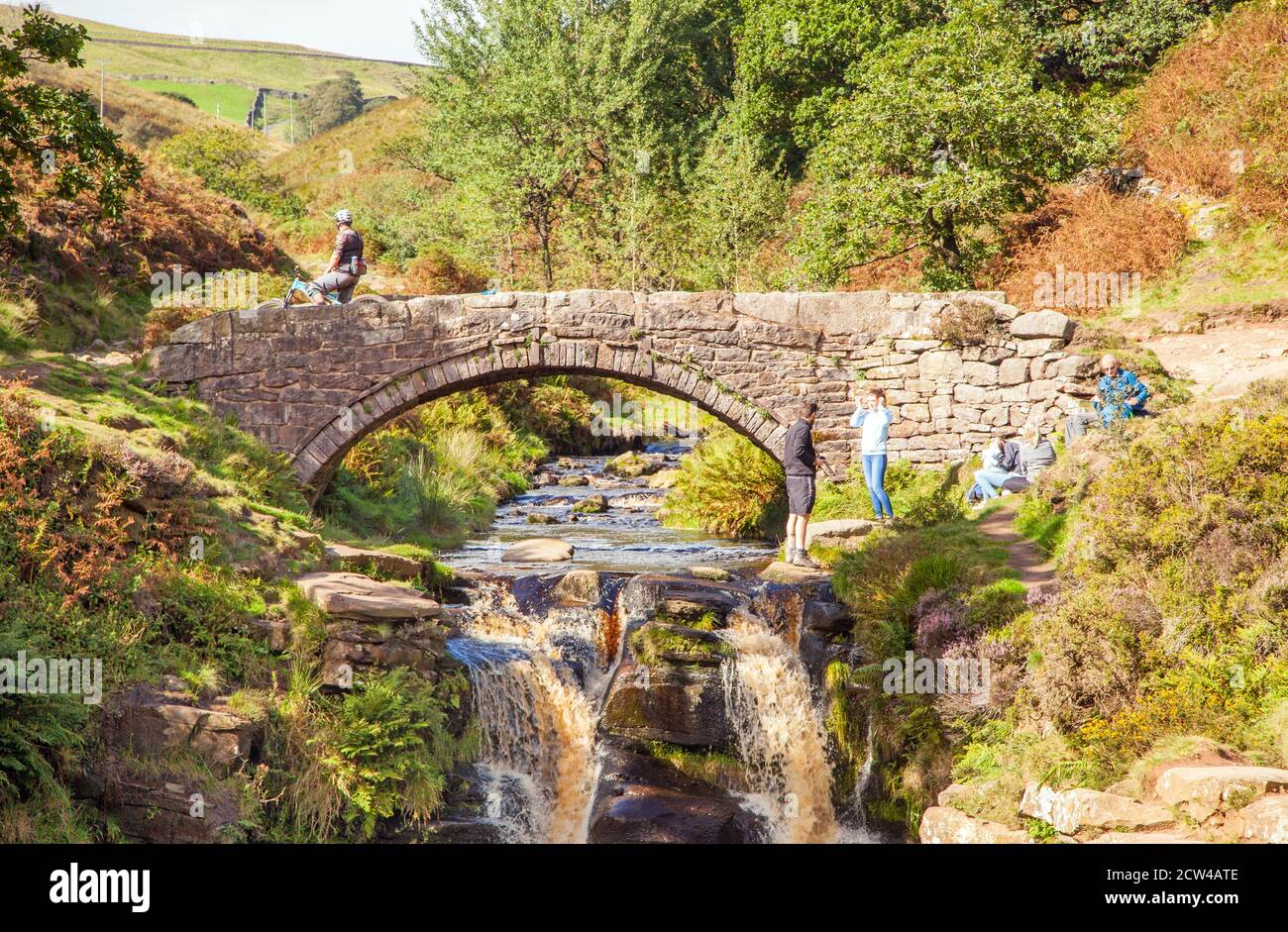 Packhorse bridge over the river Dane at the Three Shire Heads on Axe