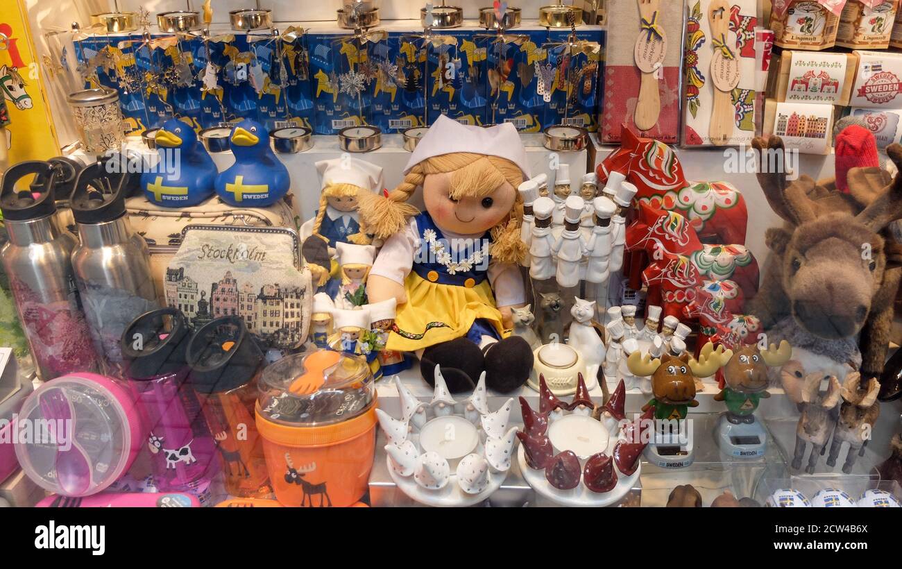 Stockholm's souvenir shops with t-shirt, tomte, moose, viking helmet, dala  horse and other scandinavian and nordic specialities Stock Photo - Alamy