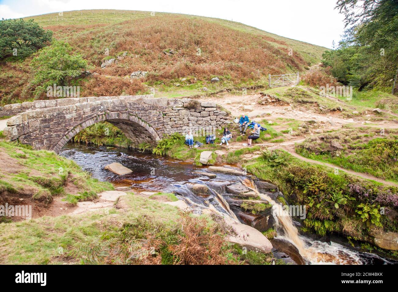 Packhorse bridge over the river Dane at the Three Shire Heads on Axe