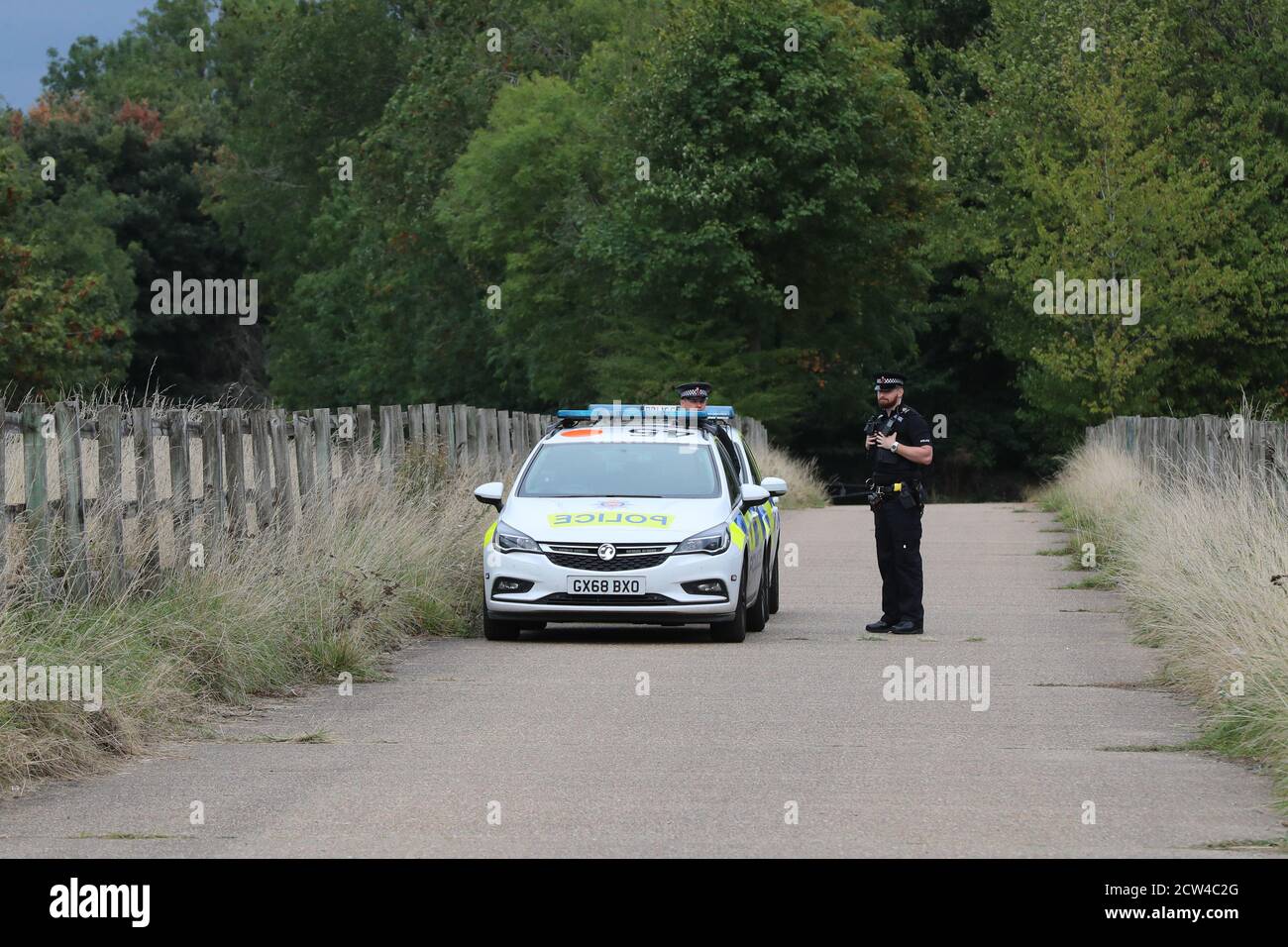 Police at Courtlands Farm in Banstead, Surrey, where officers carried out searches in relation to the murder of police officer Sergeant Matt Ratana who was shot at Croydon Custody Centre in south London in the early hours of Friday morning. The officer was treated at the scene before being taken to hospital where he subsequently died. Stock Photo