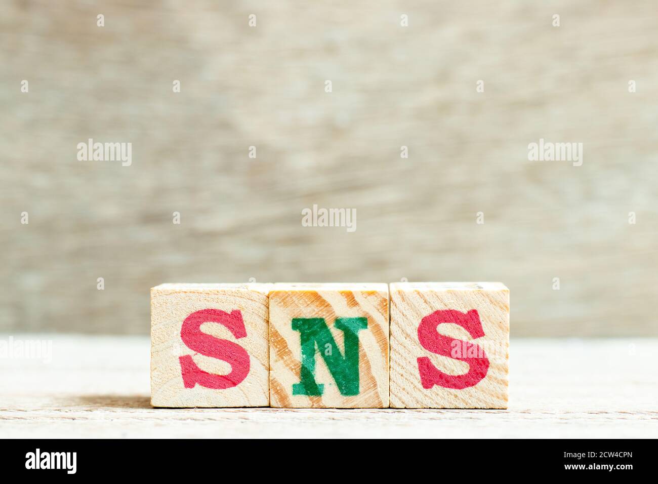 Alphabet letter in word SNS (abbreviation of Social Networking Site or  sorry not sorry) on wood background Stock Photo - Alamy