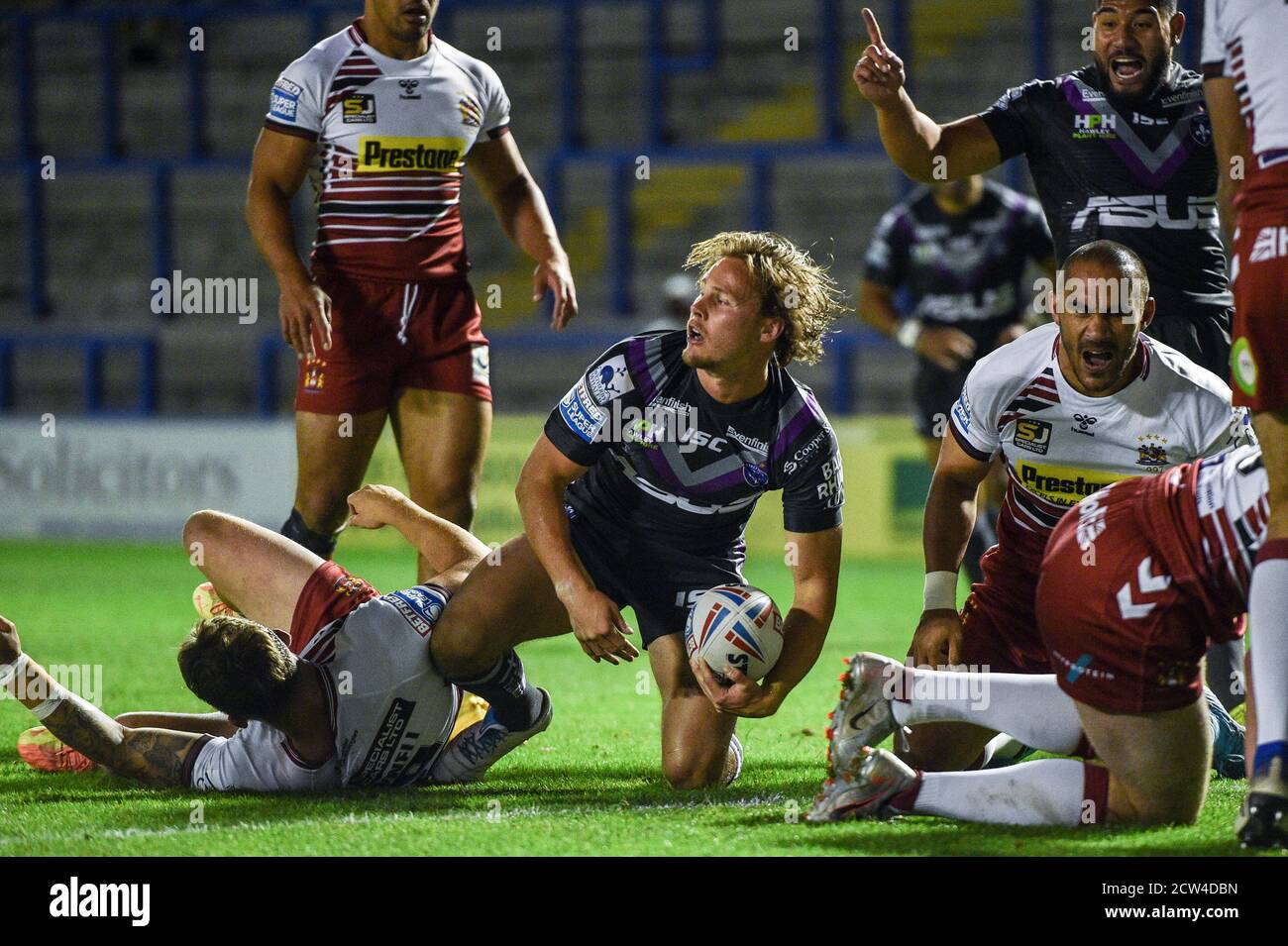 Wakefield Trinity's Jacob Miller cut through to score a try. Stock Photo