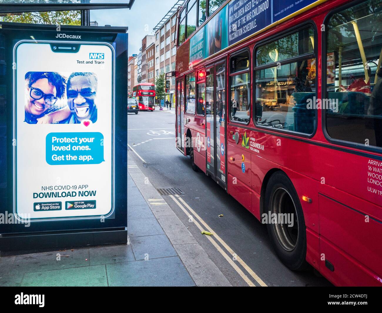 NHS Test and Trace App - Adverts for the NHS Test & Trace App in a bus shelter in Central London Stock Photo