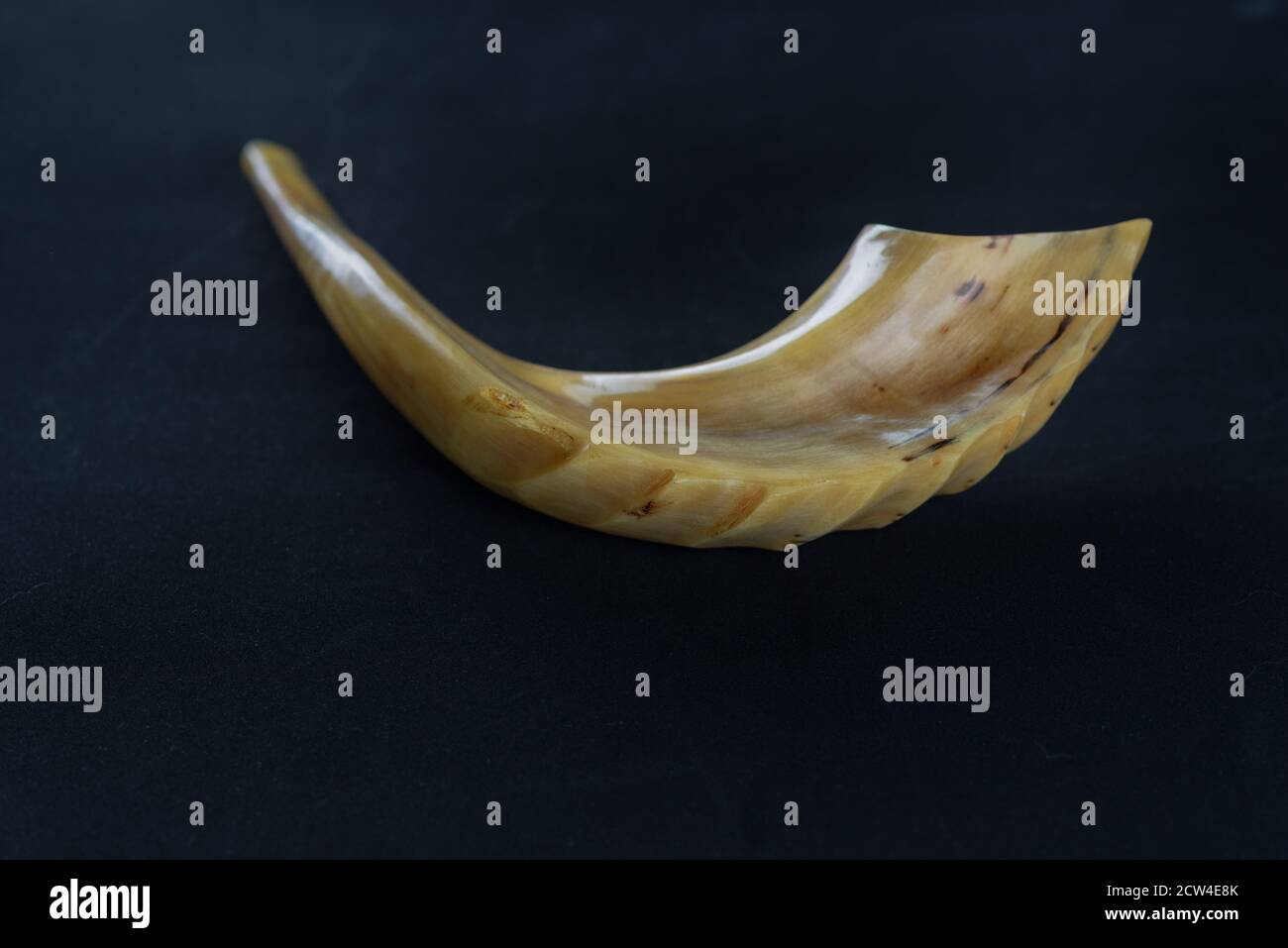Shofar horn on black background. ShofarReligious and Jewish Holidays
