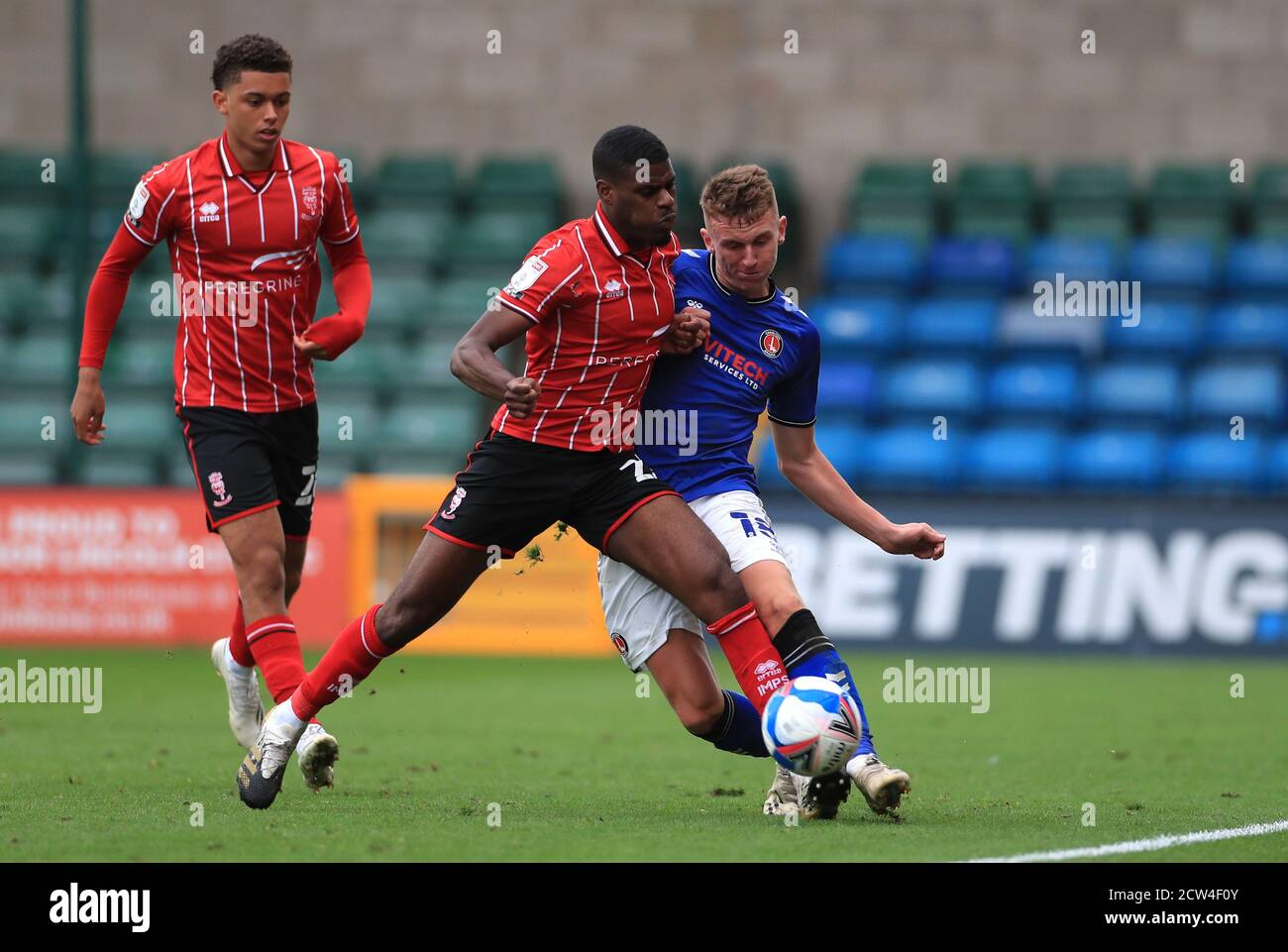 Charlton Athletic S Alfie Doughty Right And Lincoln City S Timothy Eyoma Battle For The Ball During The Sky Bet League One Match At Lner Stadium Lincoln Stock Photo Alamy