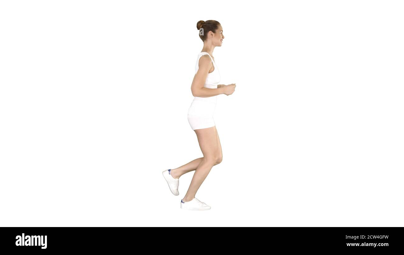 Athletic woman running on white background Stock Photo Alamy