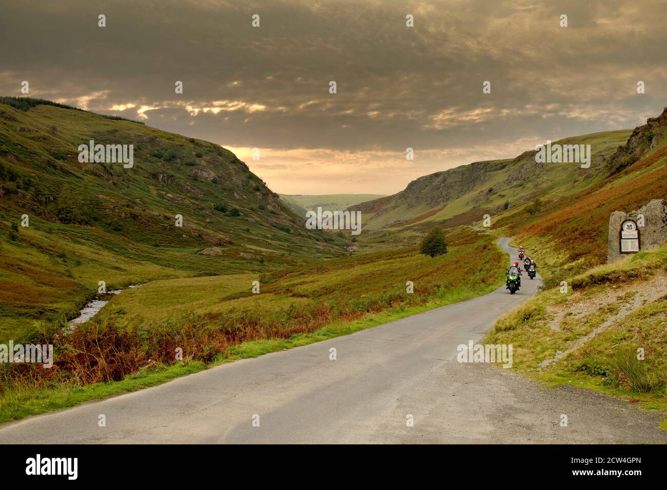 Motor-cyclists ride the National Cycle trail on the Abergwestyn Common in the Elan River valley, near Builth Wells, Mid Wales Stock Photo