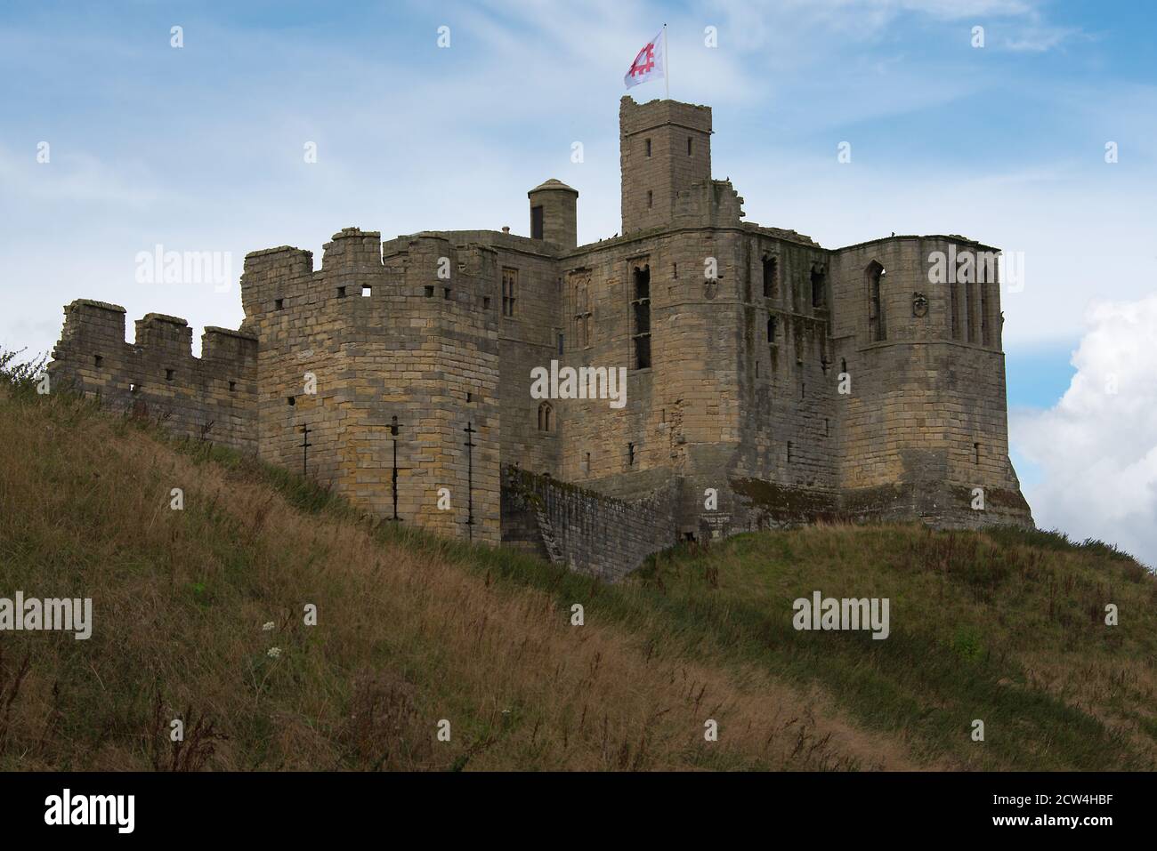 Warkworth Castle from the village of Warkworth Stock Photo
