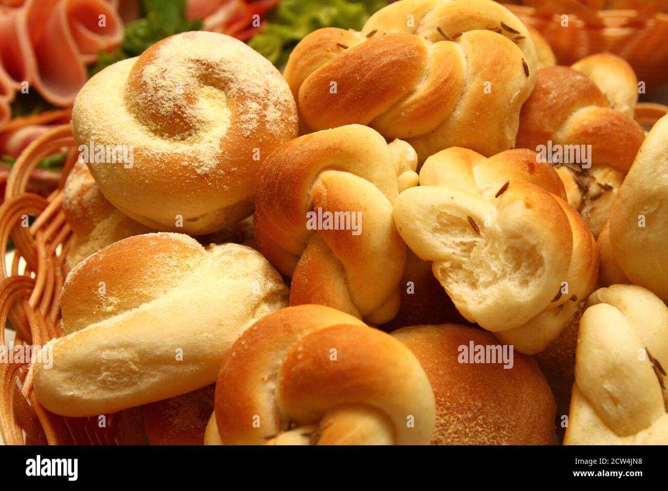 Sausage bread rolls served in the table Stock Photo