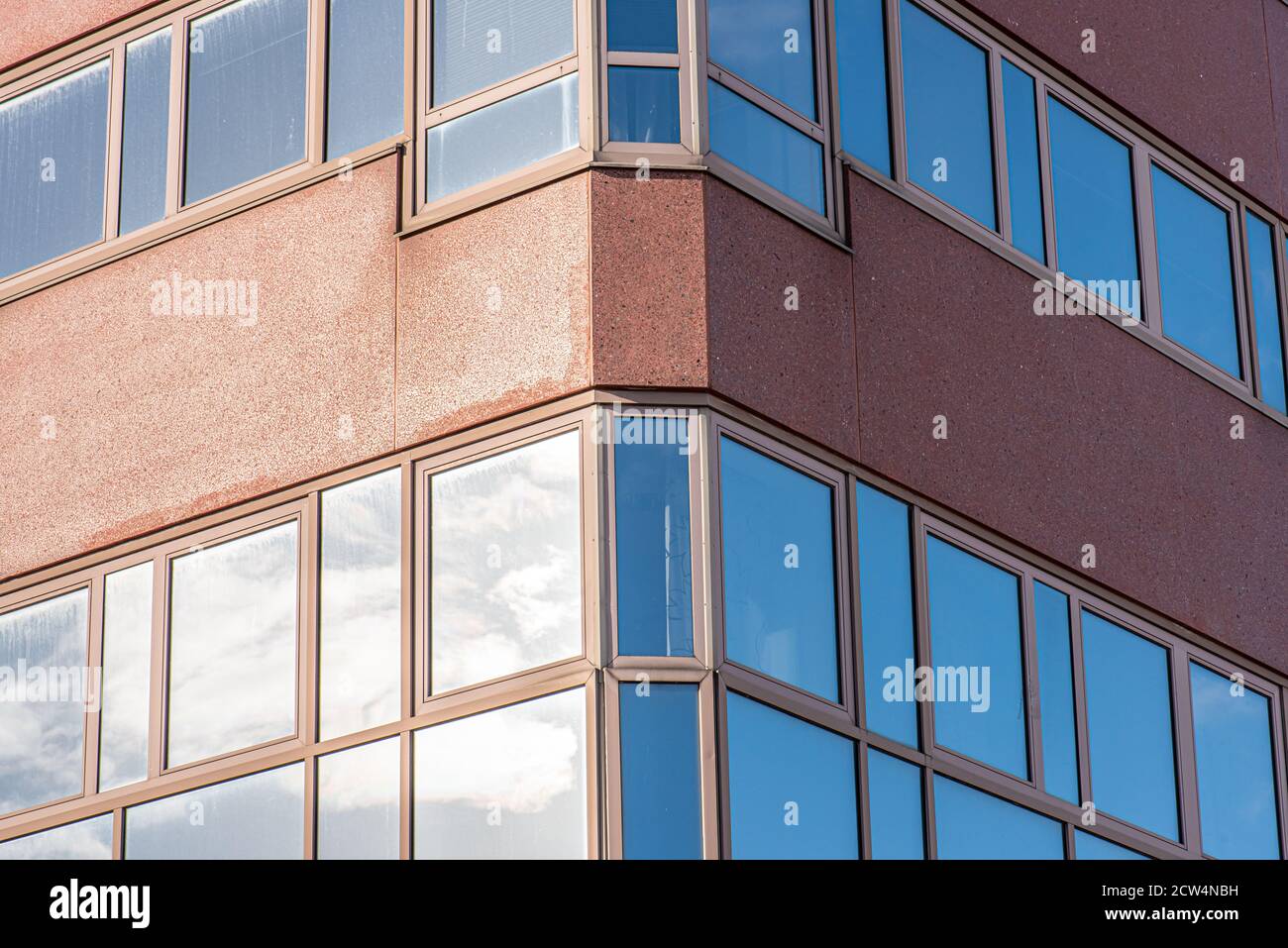 Glass facade of an abandoned office complex Stock Photo - Alamy
