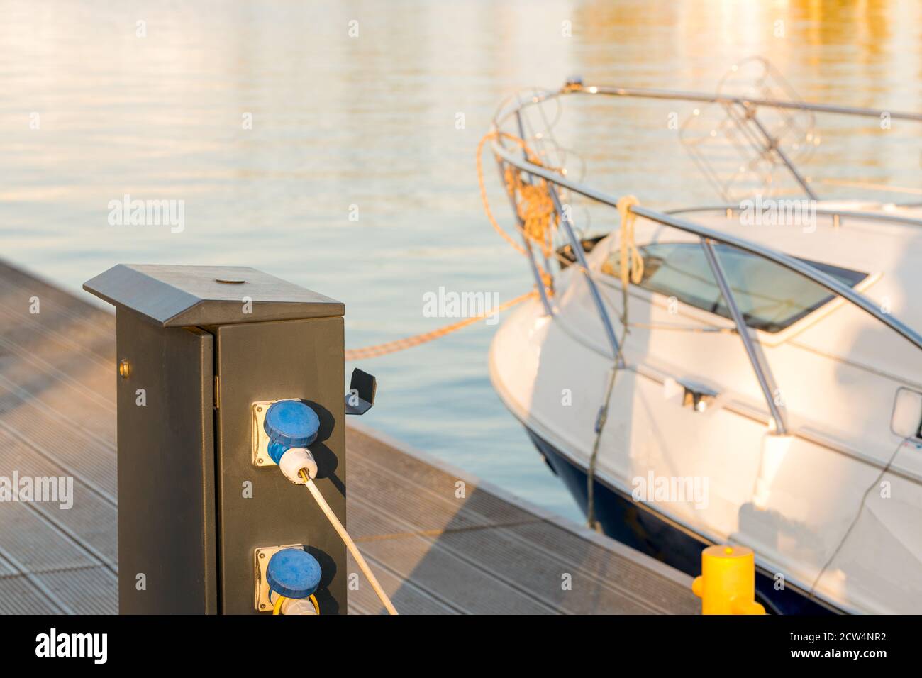 Charging boat batteries at the marina Stock Photo Alamy
