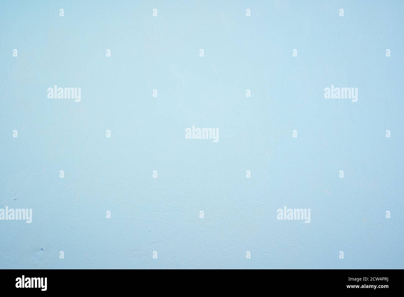 Pale blue concrete background with visible texture, top view. Stock Photo