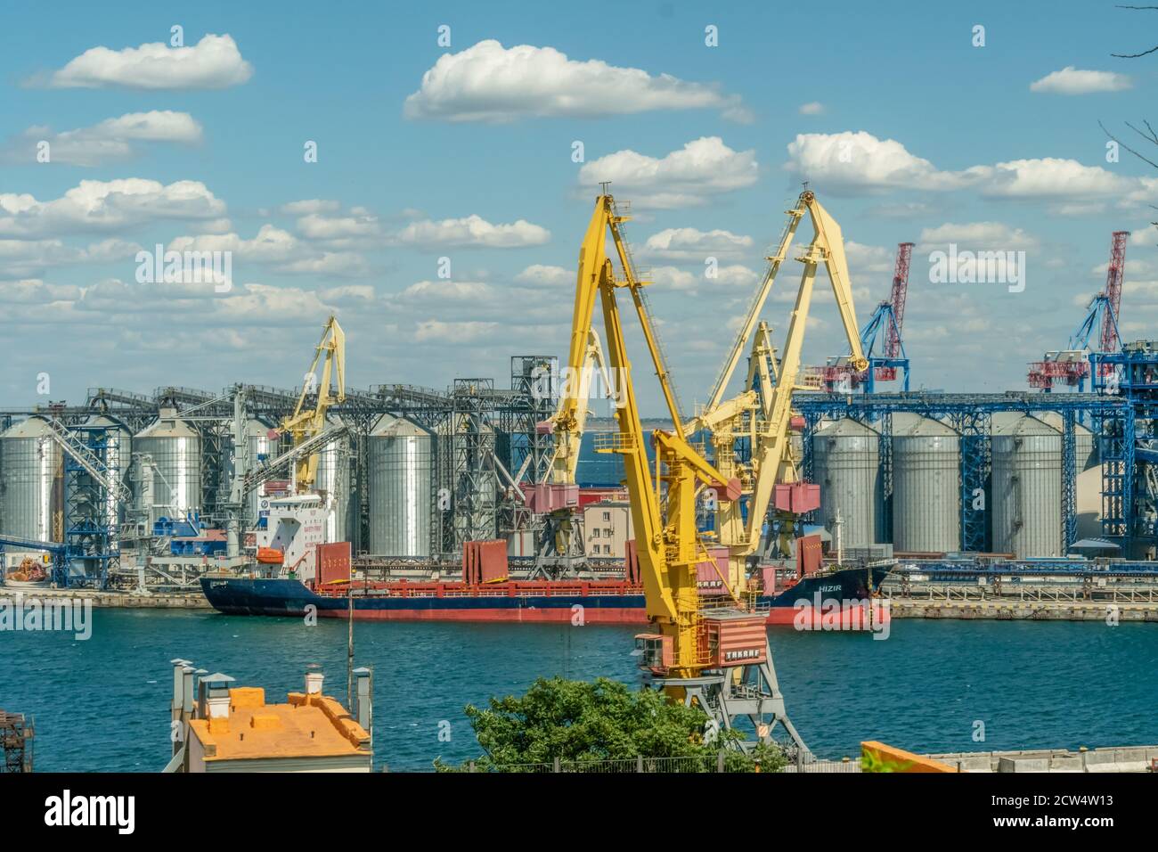 Odessa, Ukraine August 17 2019 Cargo crane, ship and grain dryer in port Stock Photo Alamy