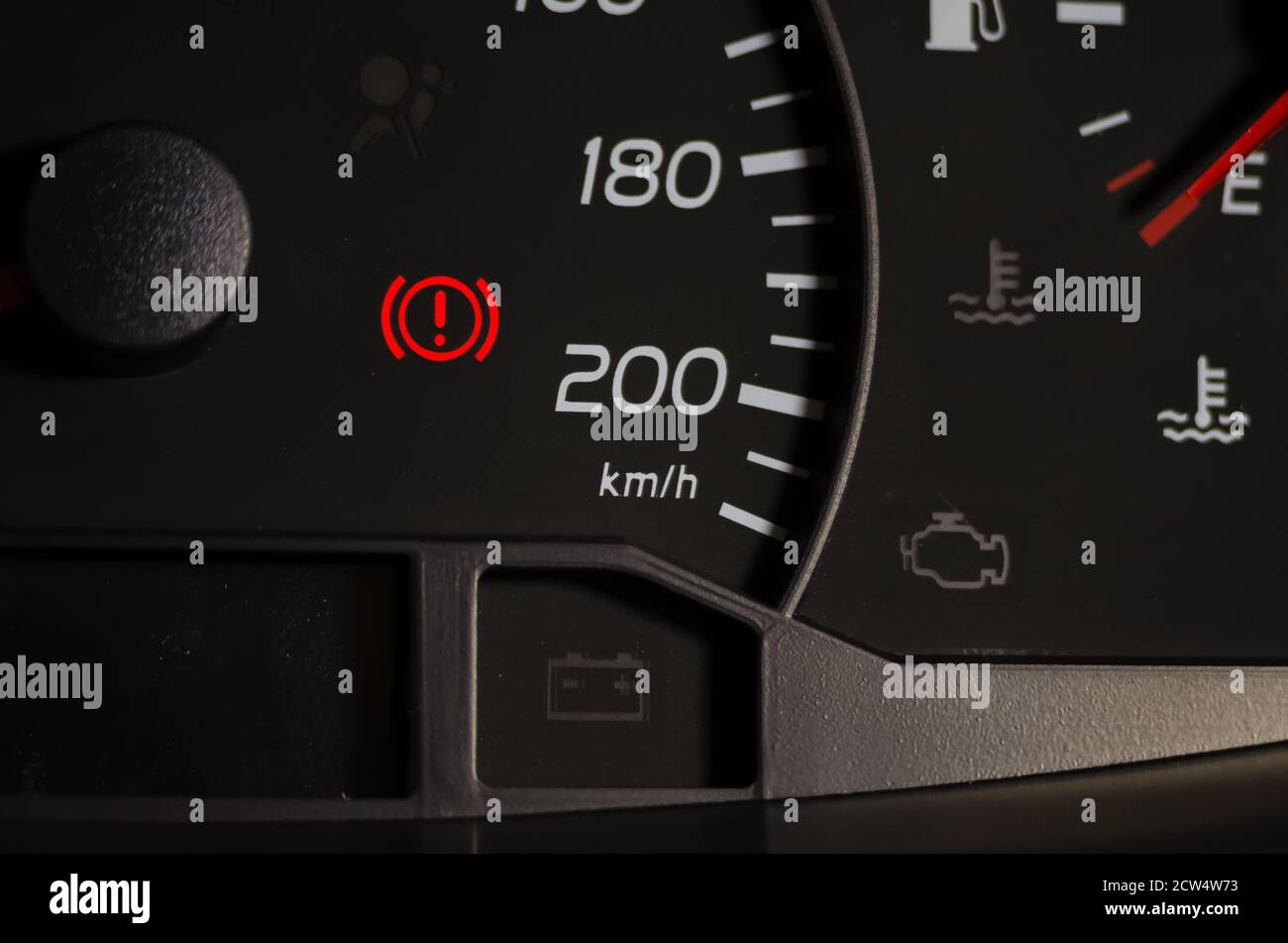 Parking brake indicator lamp in the dashboard of the vehicle is lit in