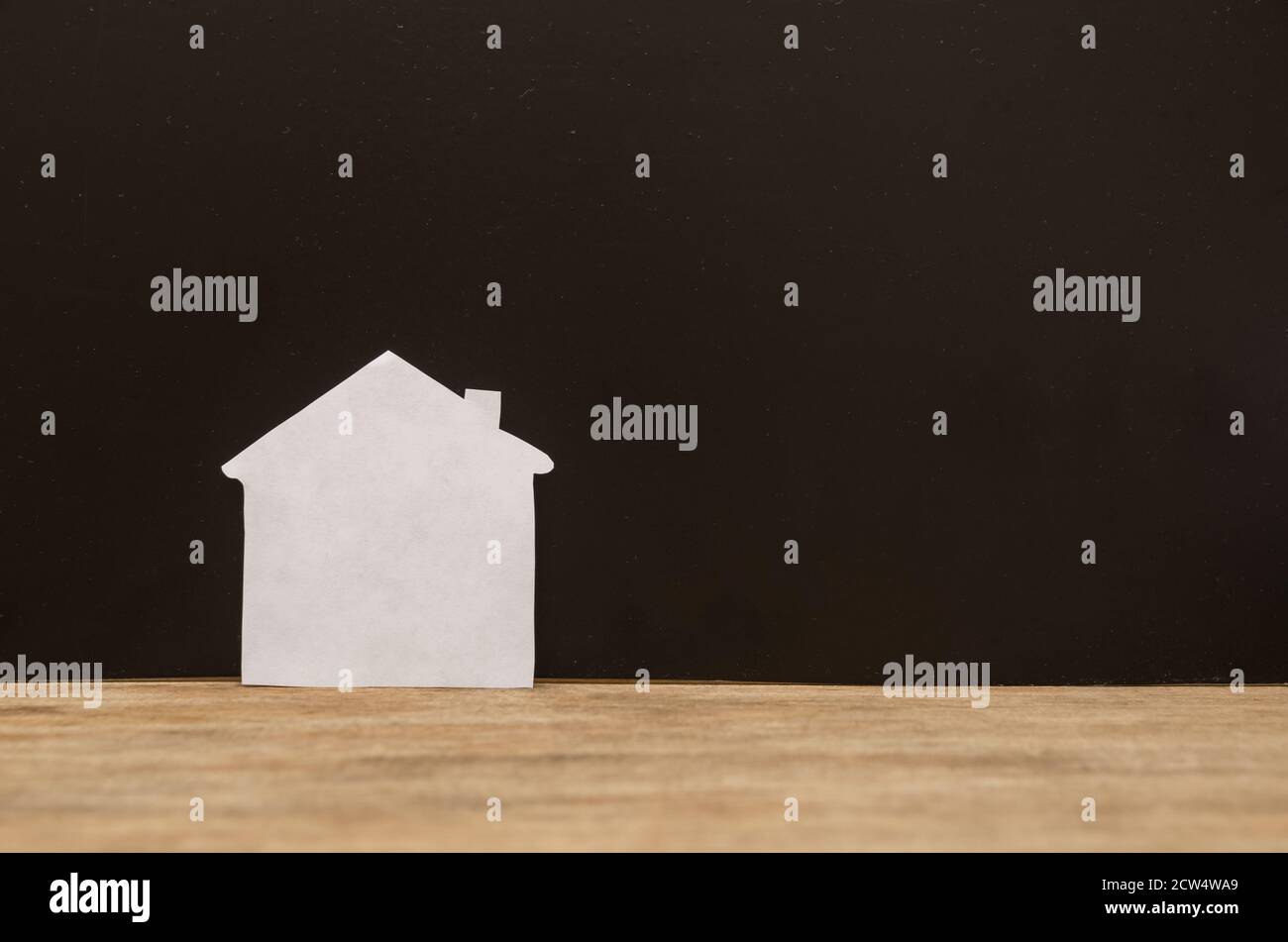 The white house on a black background. The concept of real estate Stock ...