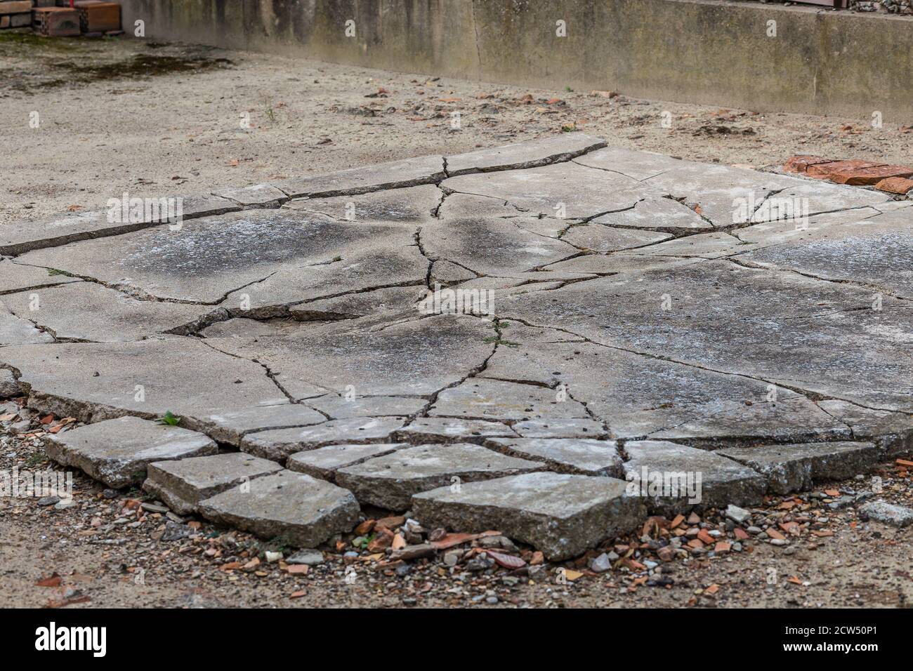 Cracked pavement stones in hi-res stock photography and images - Alamy