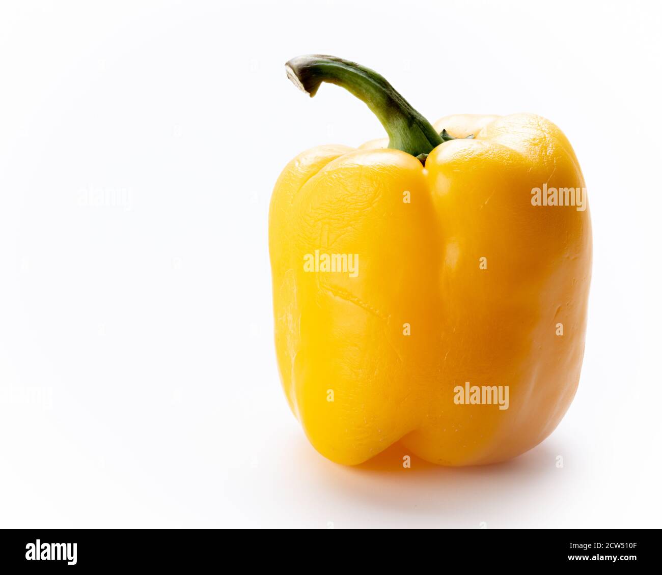 Vegetable pepper yellow in color on a white background Stock Photo Alamy