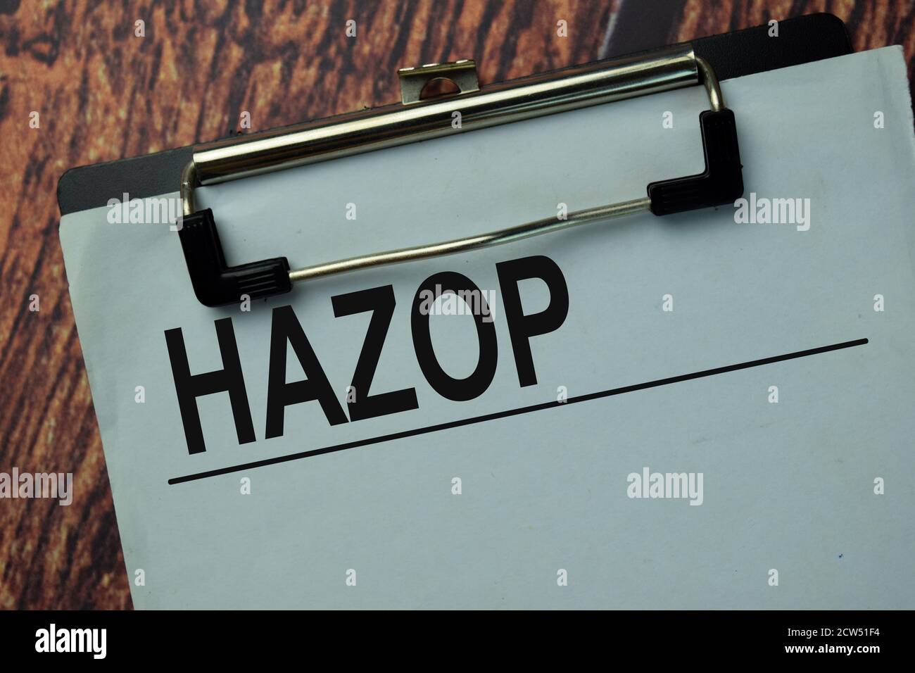 Hazop write on a paperwork isolated on office desk. Stock Photo