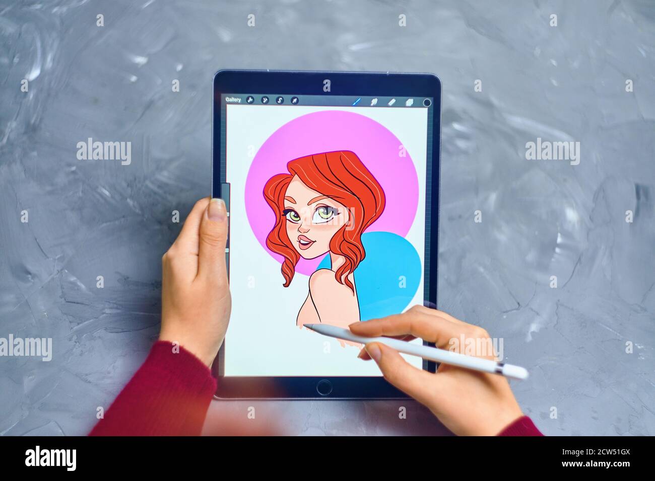 Woman Illustrator Draws A Portrait Of A Girl On An Ipad Pro In Procreate App Using Apple Pencil Digital Illustrator Freelance Work As A Designer Bishkek Kyrgyzstan January 21 19 Stock Photo Alamy