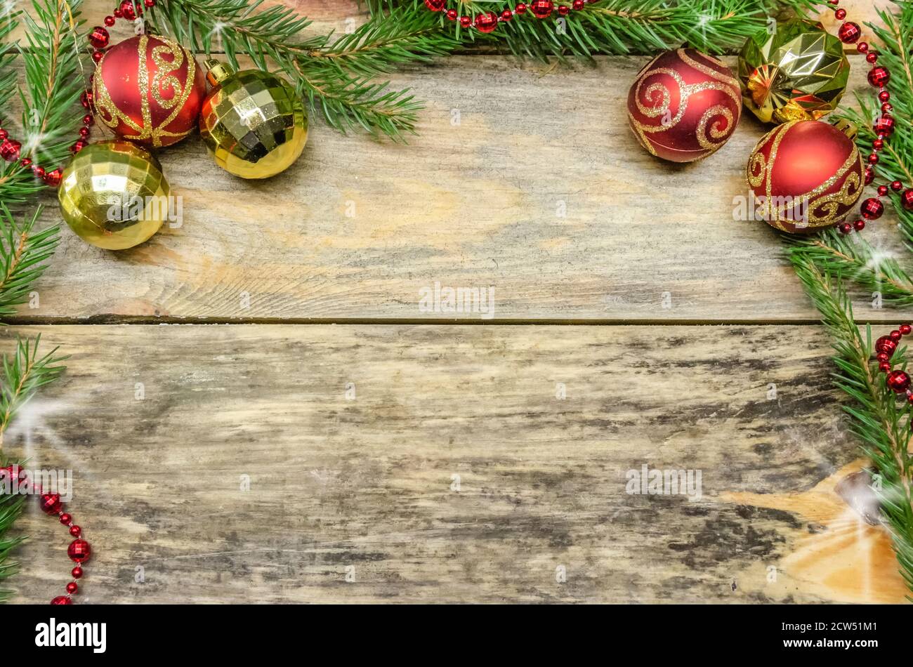 Beautiful, bright Christmas background. Christmas tree branches, Christmas  balls, beads on a wooden background, place to copy space Stock Photo - Alamy, image size:1300x950