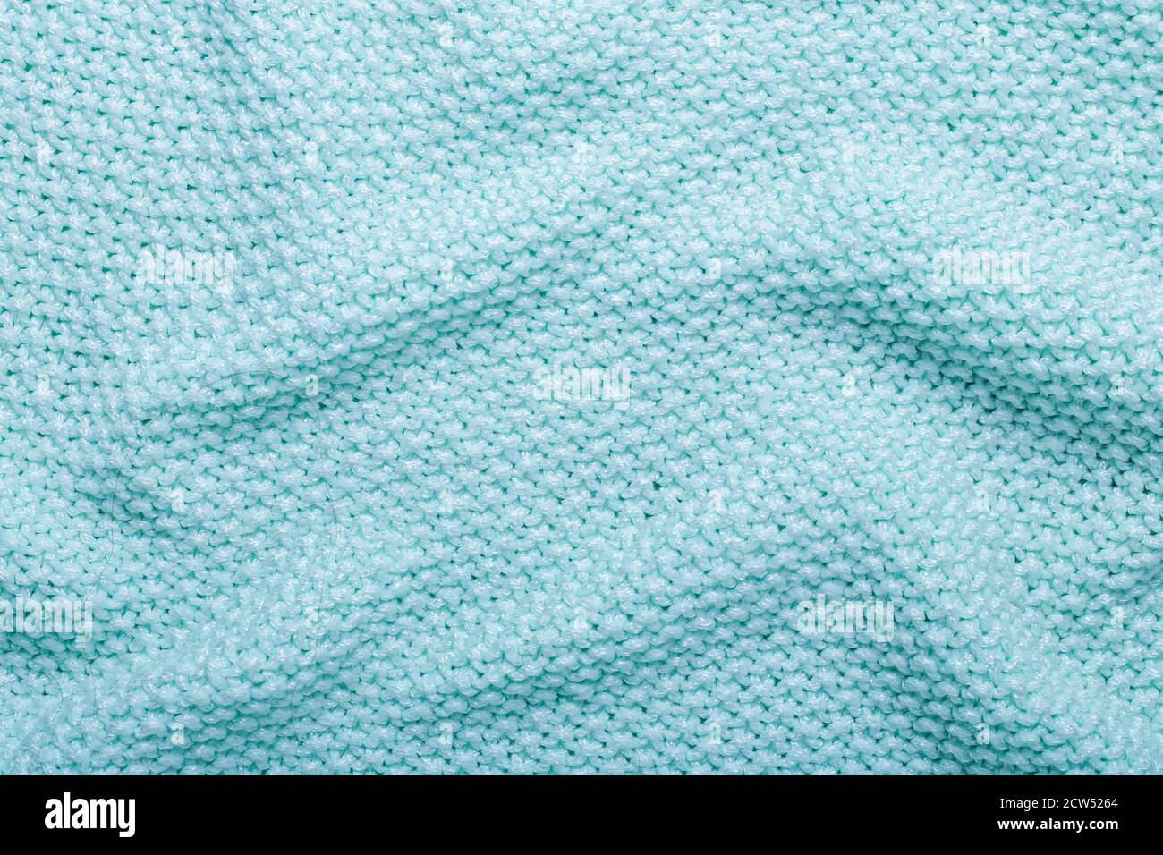 Mint knitting wool texture background Crocheted fabric texture Stock Photo