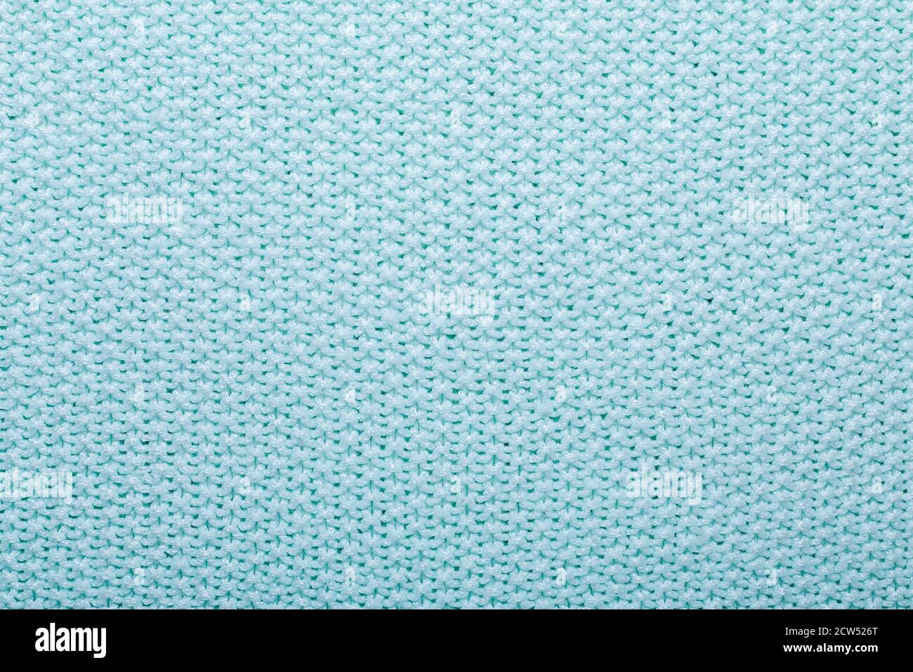 Mint knitting wool texture background Crocheted fabric texture Stock Photo
