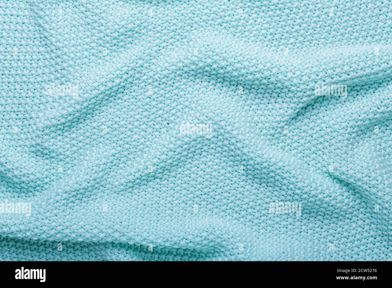 Mint knitting wool texture background Crocheted fabric texture Stock Photo