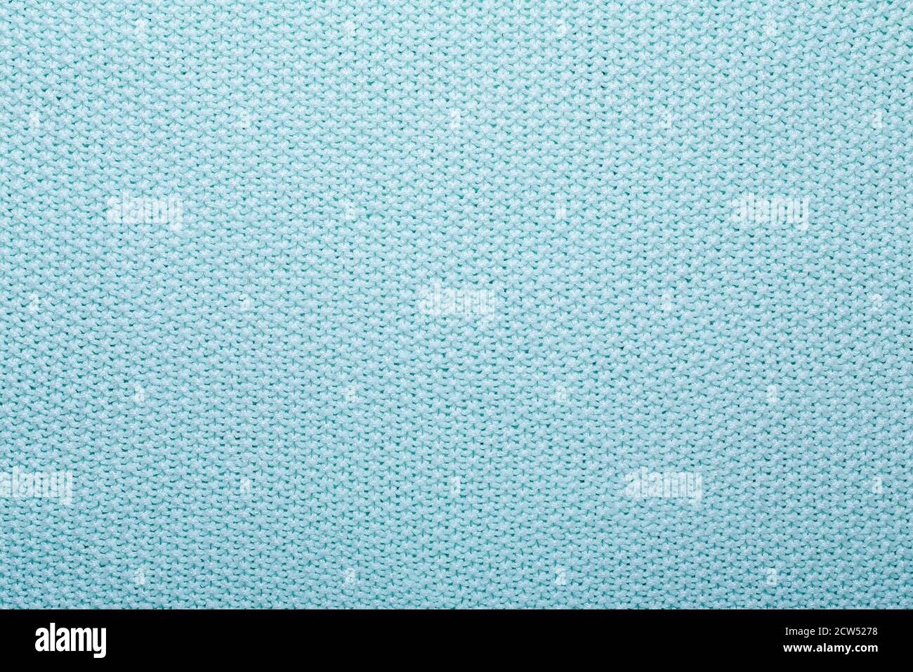 Mint knitting wool texture background Crocheted fabric texture Stock Photo