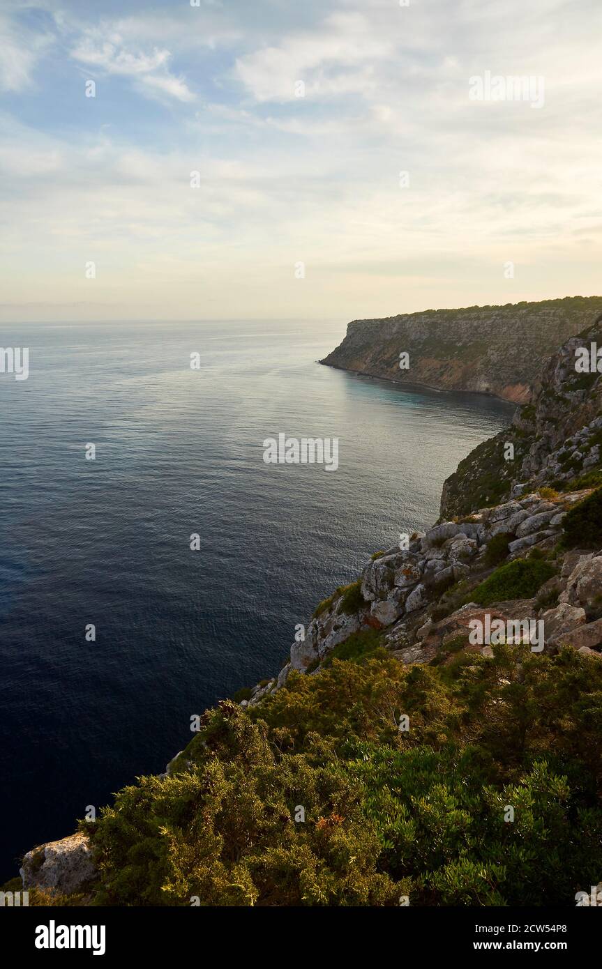 Cliffs and coastline from Cala Codolar to Punta Roja cape (Sa Talaiassa, La Mola, Formentera, Balearic Islands, Mediterranean Sea, Spain) Stock Photo