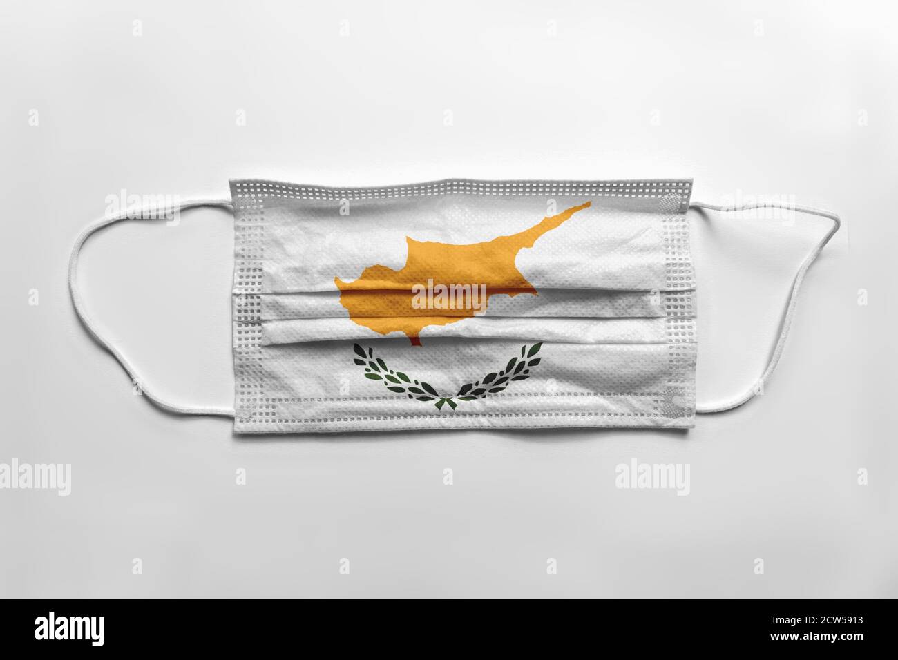 Face mask with Cyprus flag printed, on white background, isolated Stock