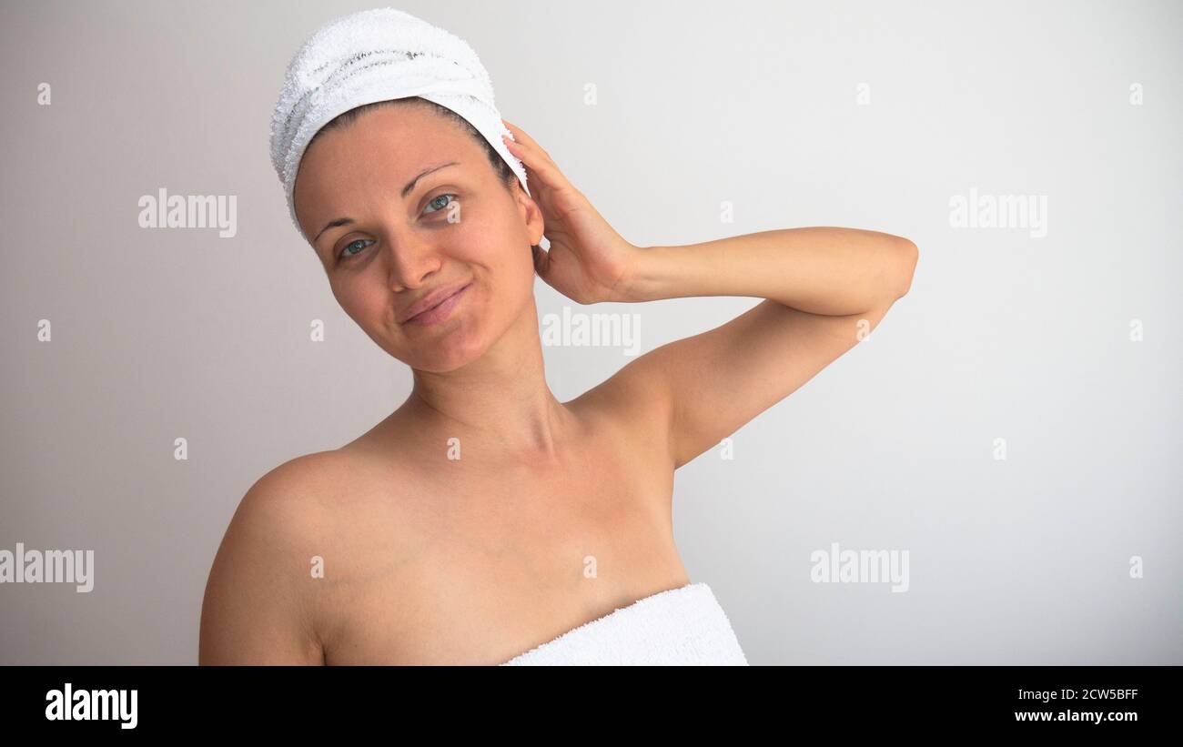 Woman after showering in a towel Stock Photo Alamy