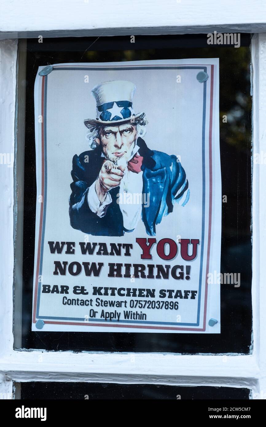 We want you now hiring poster at a pub adapted from the Uncle Sam I want you US army recruiting poster by James Montgomery Flagg Stock Photo