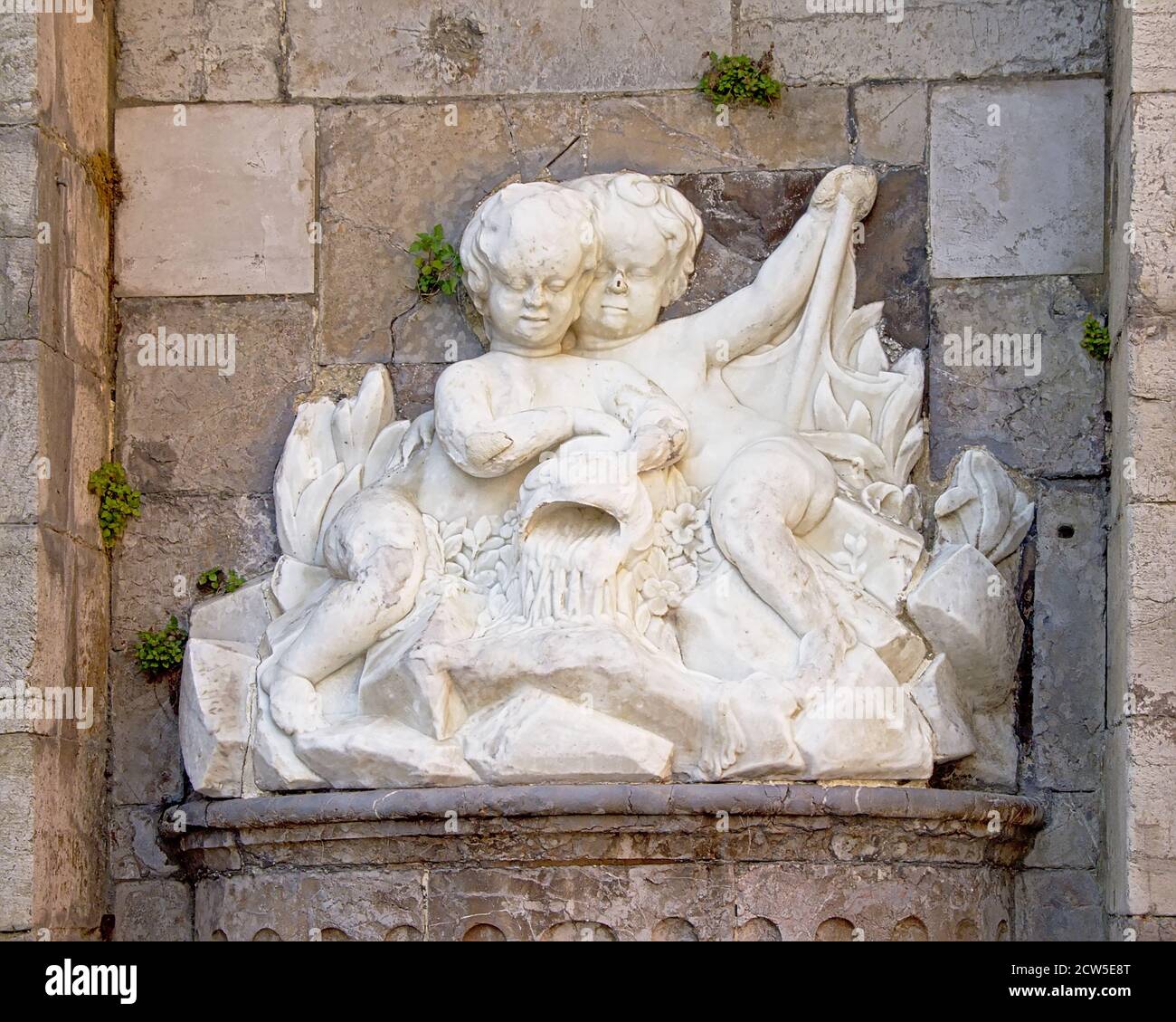 white statue with cherubs in boulogne sur mer, france Stock Photo