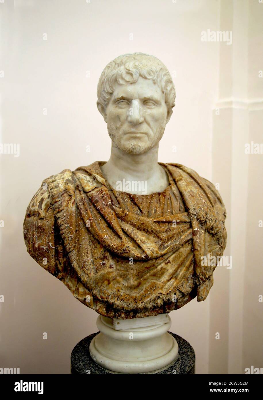 Lucius Junius Brutus ( 6th cent. BC ). Consul of the Roman Republic in 509 BC. Marble head set in alabaster bust. Naples Archaeology Museum Stock Photo