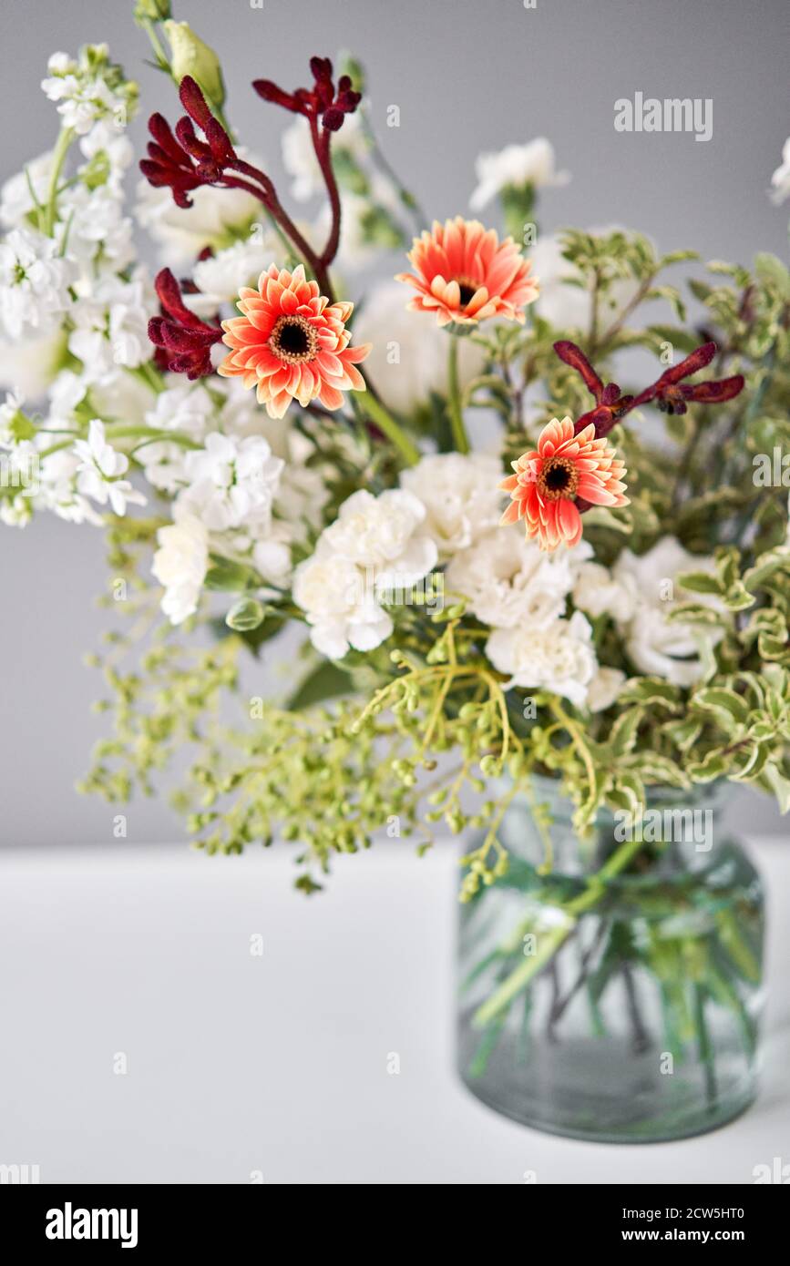 Bouquet 003. Series, step by step installation of flowers in a vase. Flowers bunch, set for home. Fresh cut flowers for decoration home. European Stock Photo