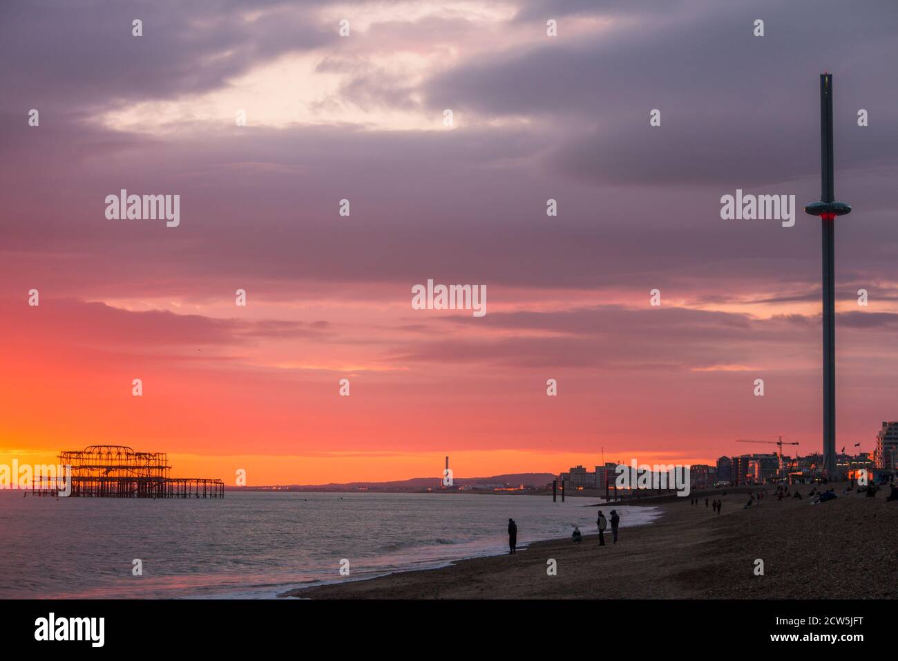 Brighton, East Sussex, England, UK. 27 September 2020 Sunset adjacent to the west pier, which was damaged in an arson attack in 2003, also visible is the British Airways i360 ©Sarah Mott / Alamy Live News ©Sarah Mott / Alamy Live News ©Sarah Mott / Alamy Live News Stock Photo
