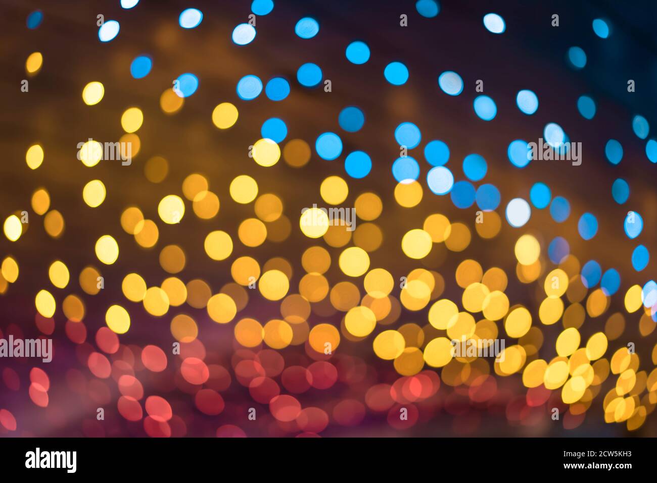 Texture of colorful shining bokeh on a dark background Stock Photo - Alamy
