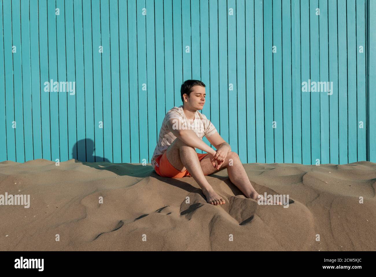 Shot young man sitting hi-res stock photography and images - Alamy