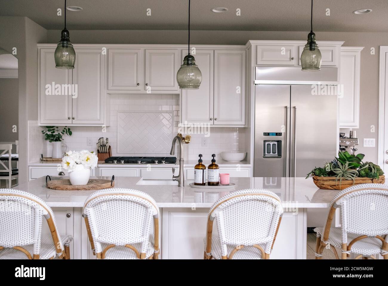 Horizontal portrait of a clean white kitchen Stock Photo