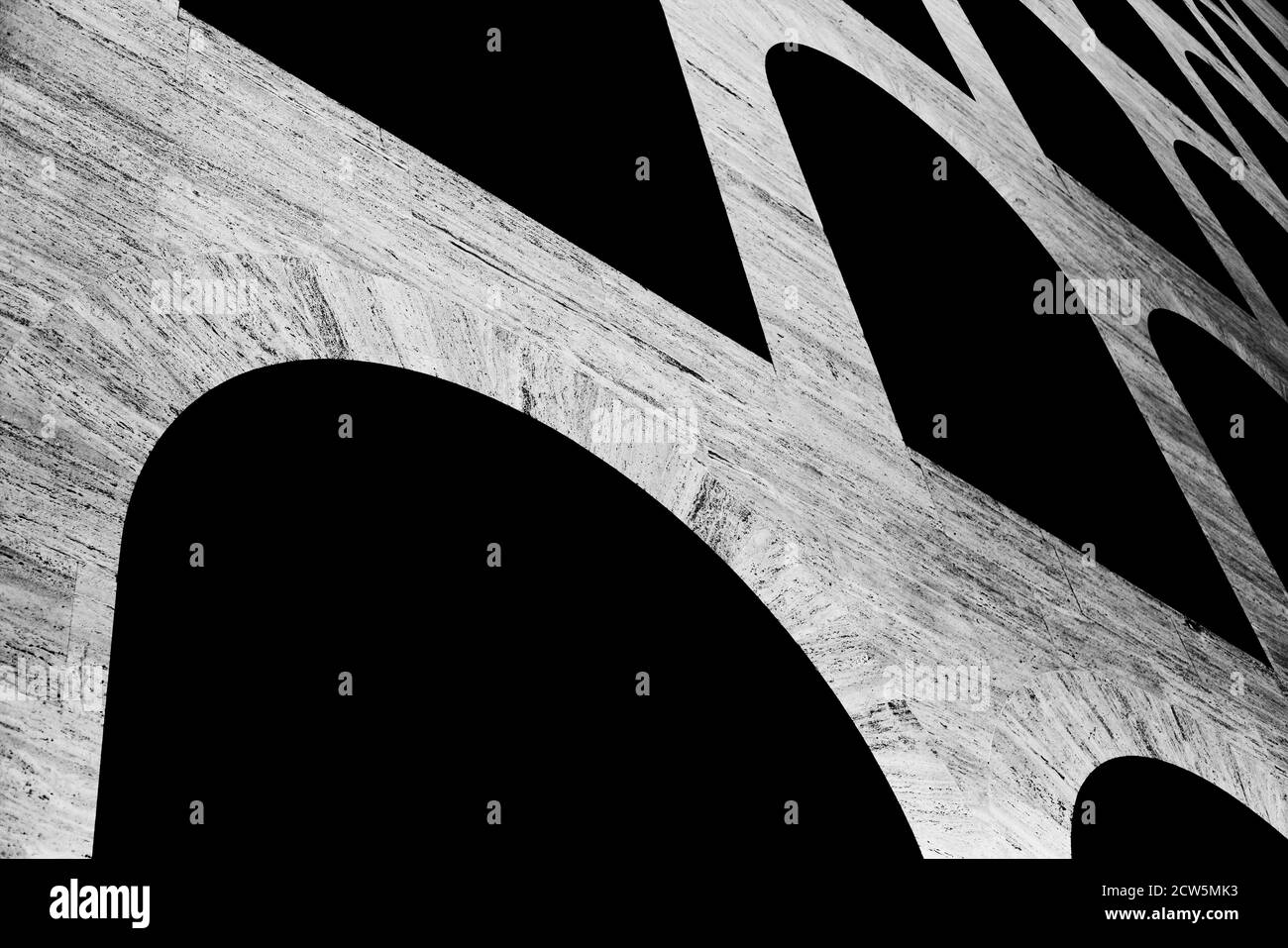 Old stone arch building, black and white Stock Photo - Alamy