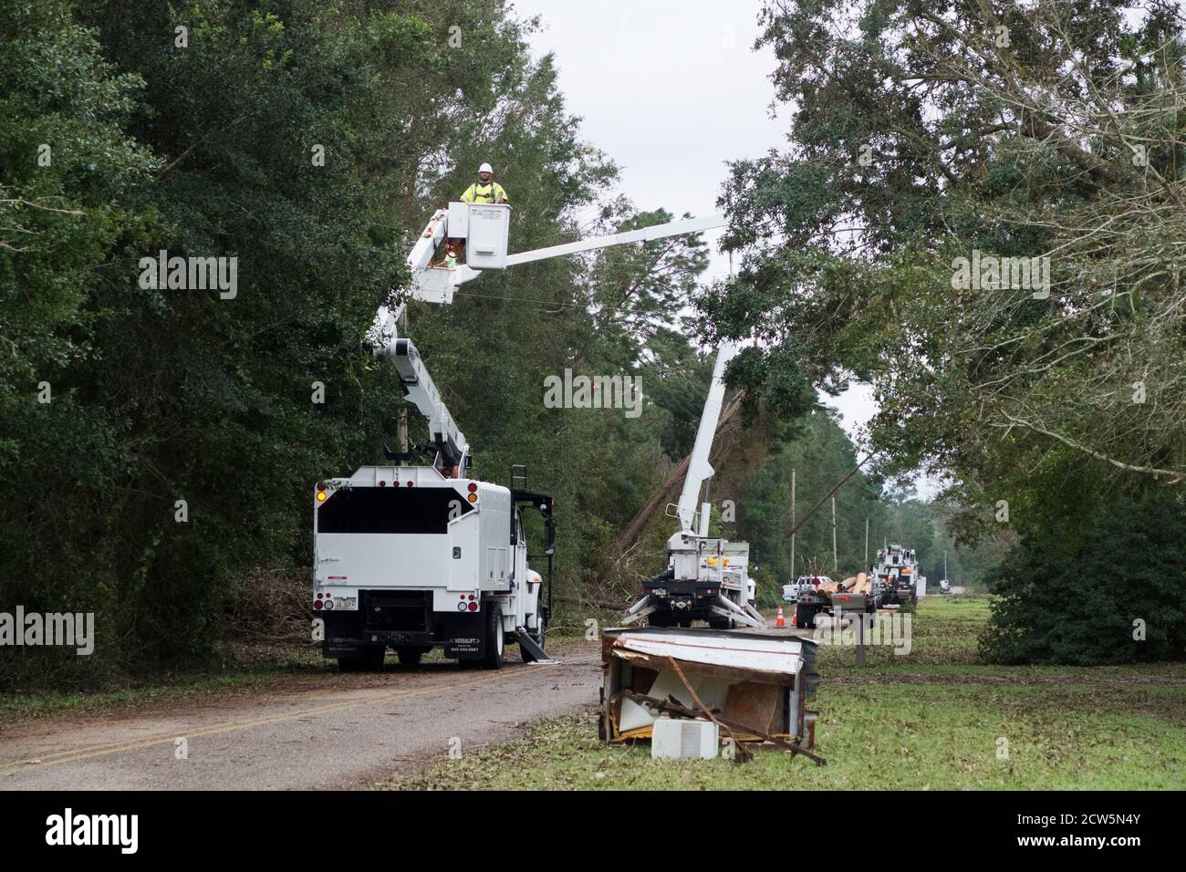 Illinois linemen restore power to Alabama residents following Hurricane Sally. Stock Photo