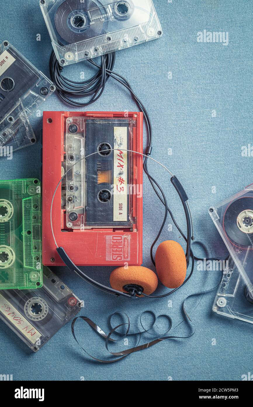 Retro audio cassette with headphones and player on blue sofa Stock ...