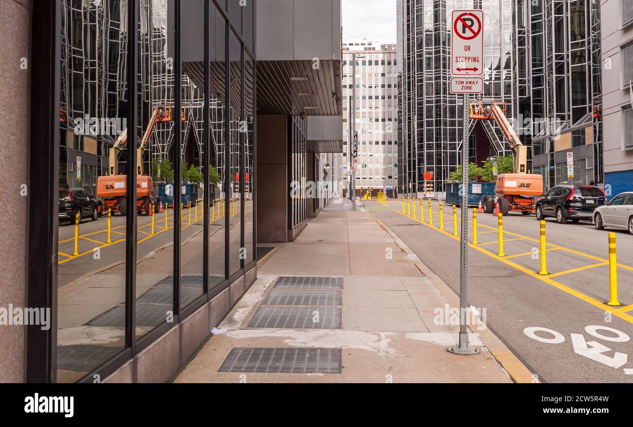 The bike lane and sidewalk along Third Avenue looking towards PPG Place