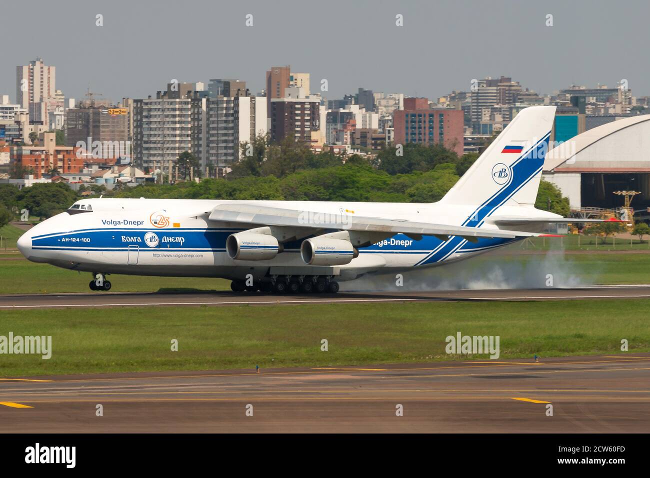Volga Dnepr Airlines Antonov 124 landing at Porto Alegre Airport, Brazil. Huge cargo aircraft An-124. RA-82047. Russian cargo airline soviet airplane. Stock Photo