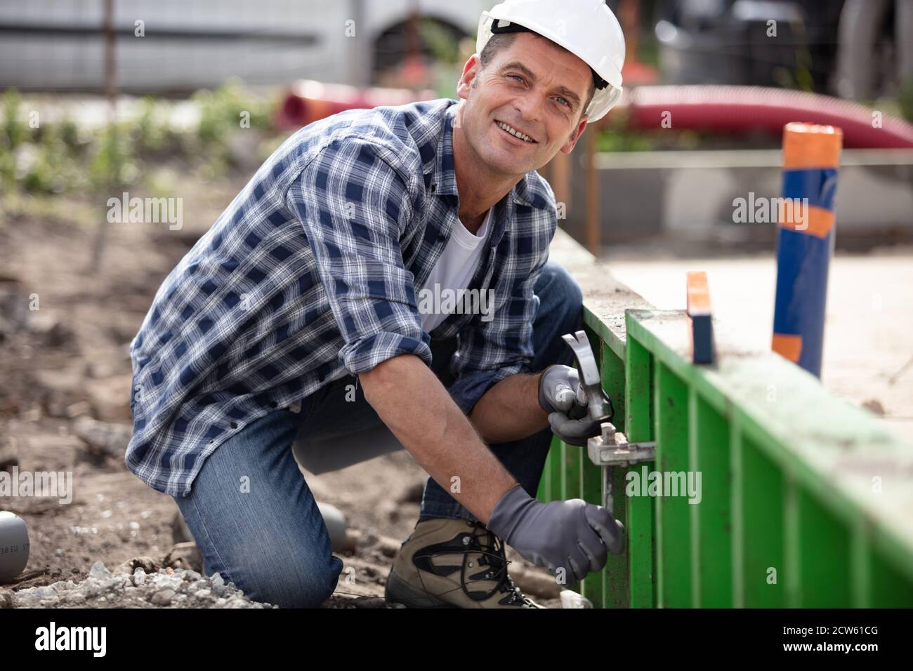 construction worker at construction site Stock Photo - Alamy