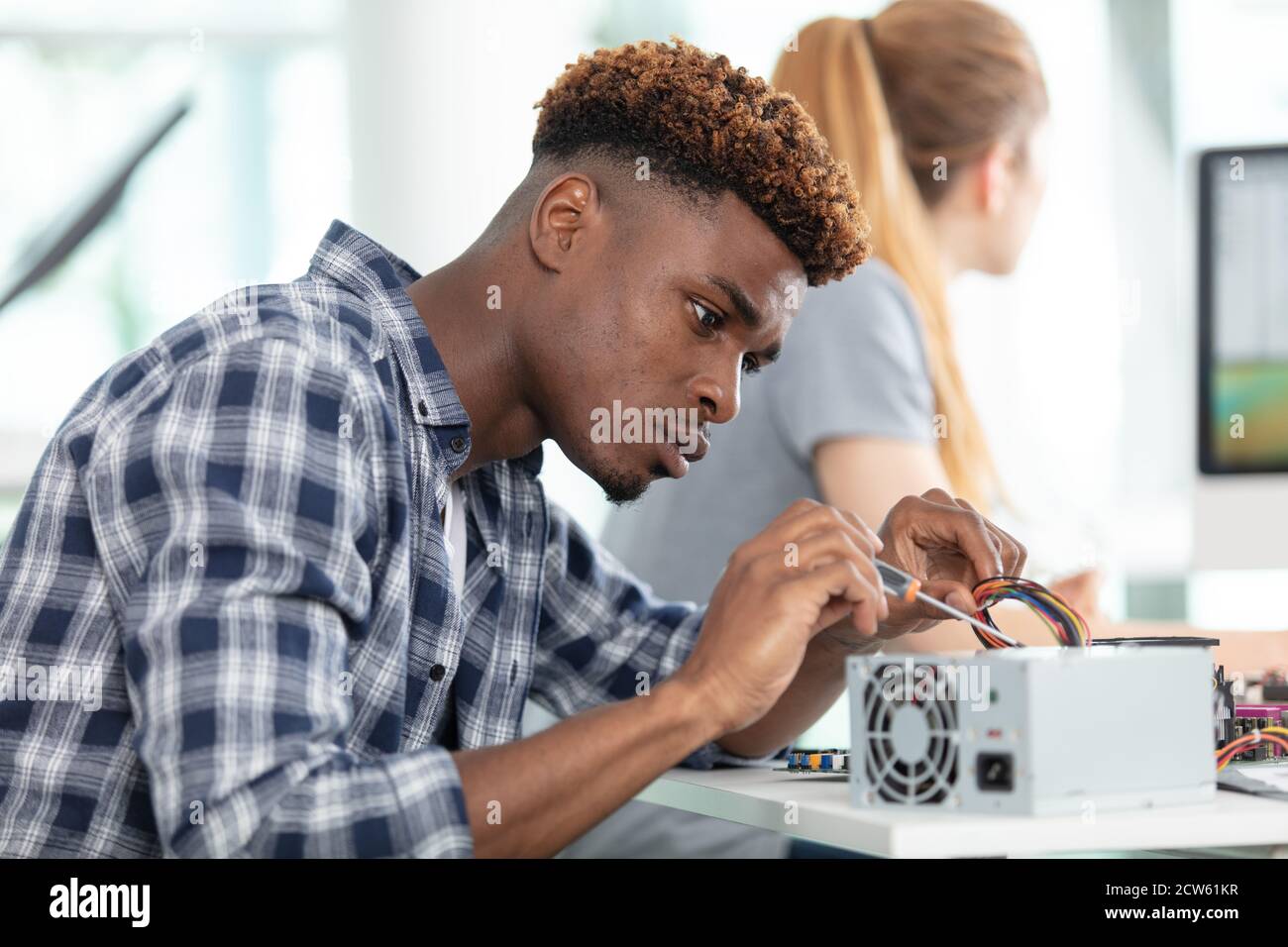 man working on wiring of a computer fan Stock Photo - Alamy