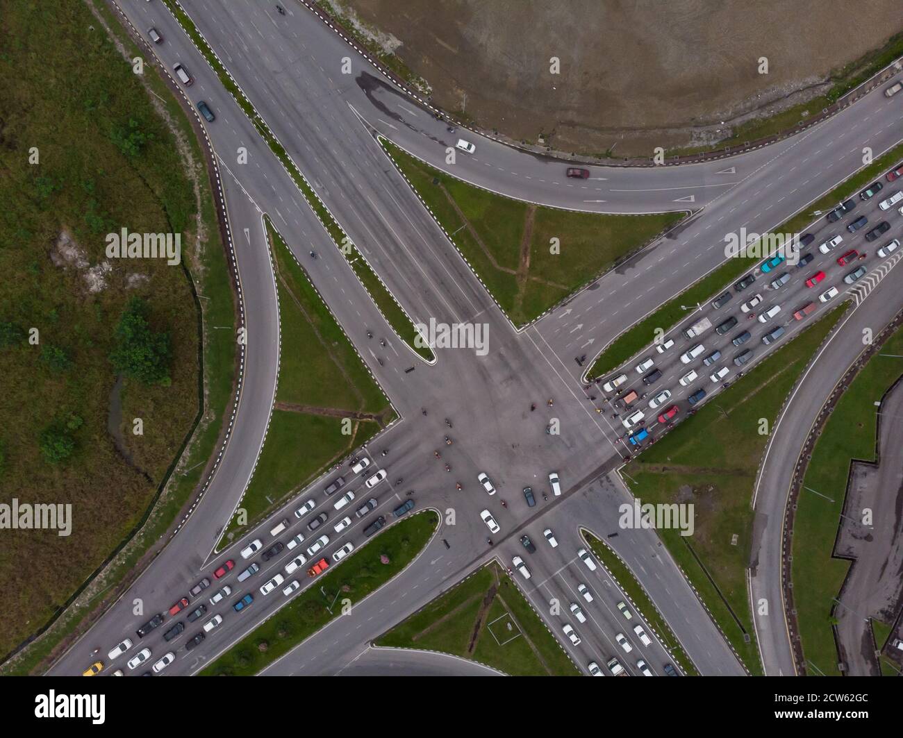 Top down view of road intersection with crowded vehicles Stock Photo ...