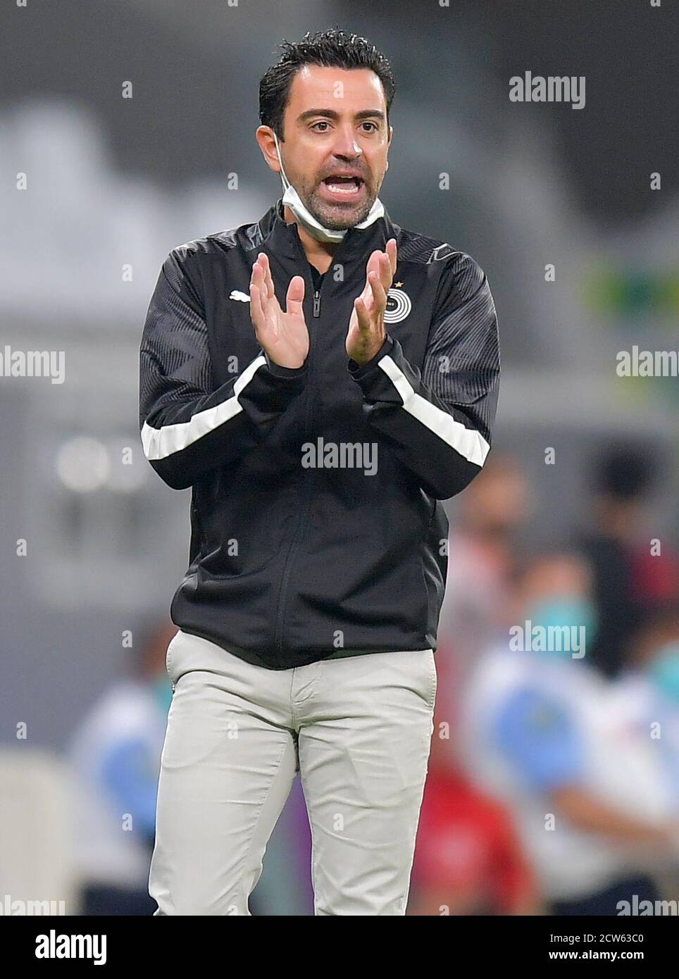 180314) -- DOHA, March 14, 2018 (Xinhua) -- Abdelkarim Hassan (C) of Al-Sadd  celebrates after scoring during the AFC Champions League Group C soccer  match between Qatar's AL-Sadd and Uzbekistan's FC Nasaf