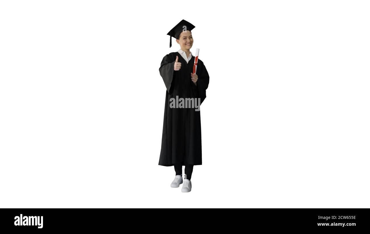 Happy graduate woman holding diploma and thumb up on white backg Stock Photo